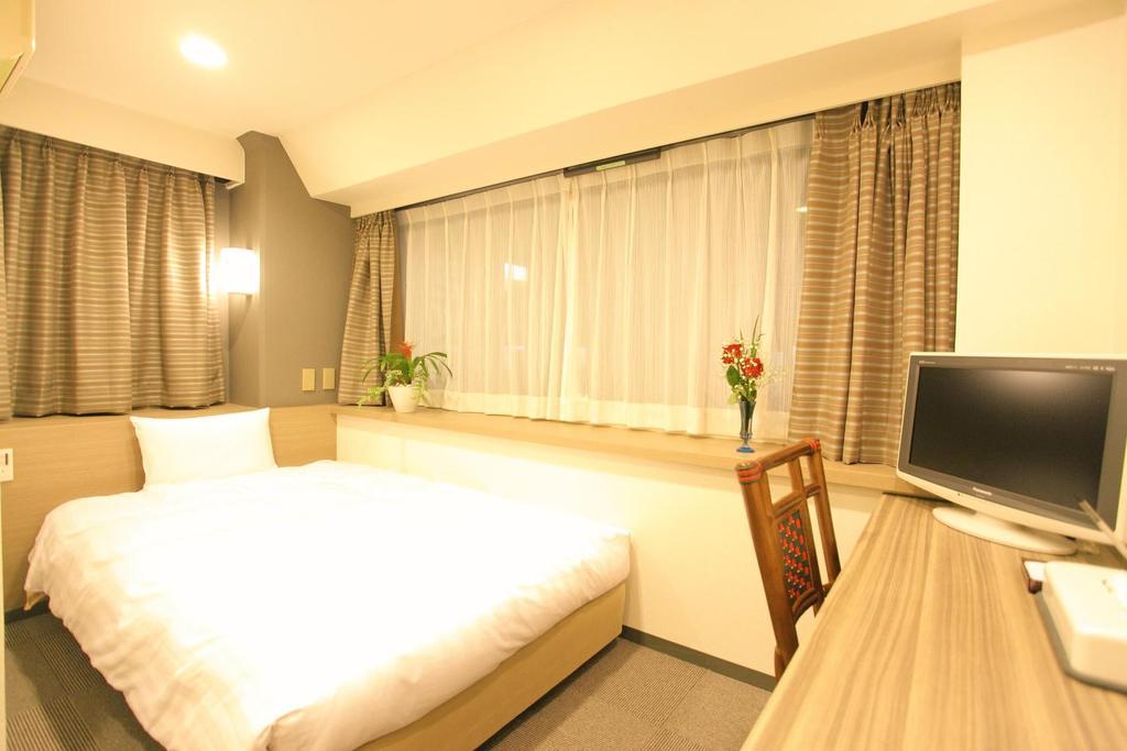 Hotel Marutani Präfektur Tokio Zimmer foto